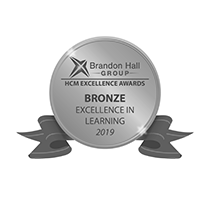 Gamelearn award Brandon Hall Group 2019 gray logo